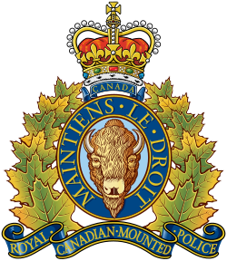 The Royal Canadian Mounted Police crest featuring a bison head in a blue circle, surrounded by gold maple leaves, a crown on top, and a blue banner reading "Royal Canadian Mounted Police" at the bottom.